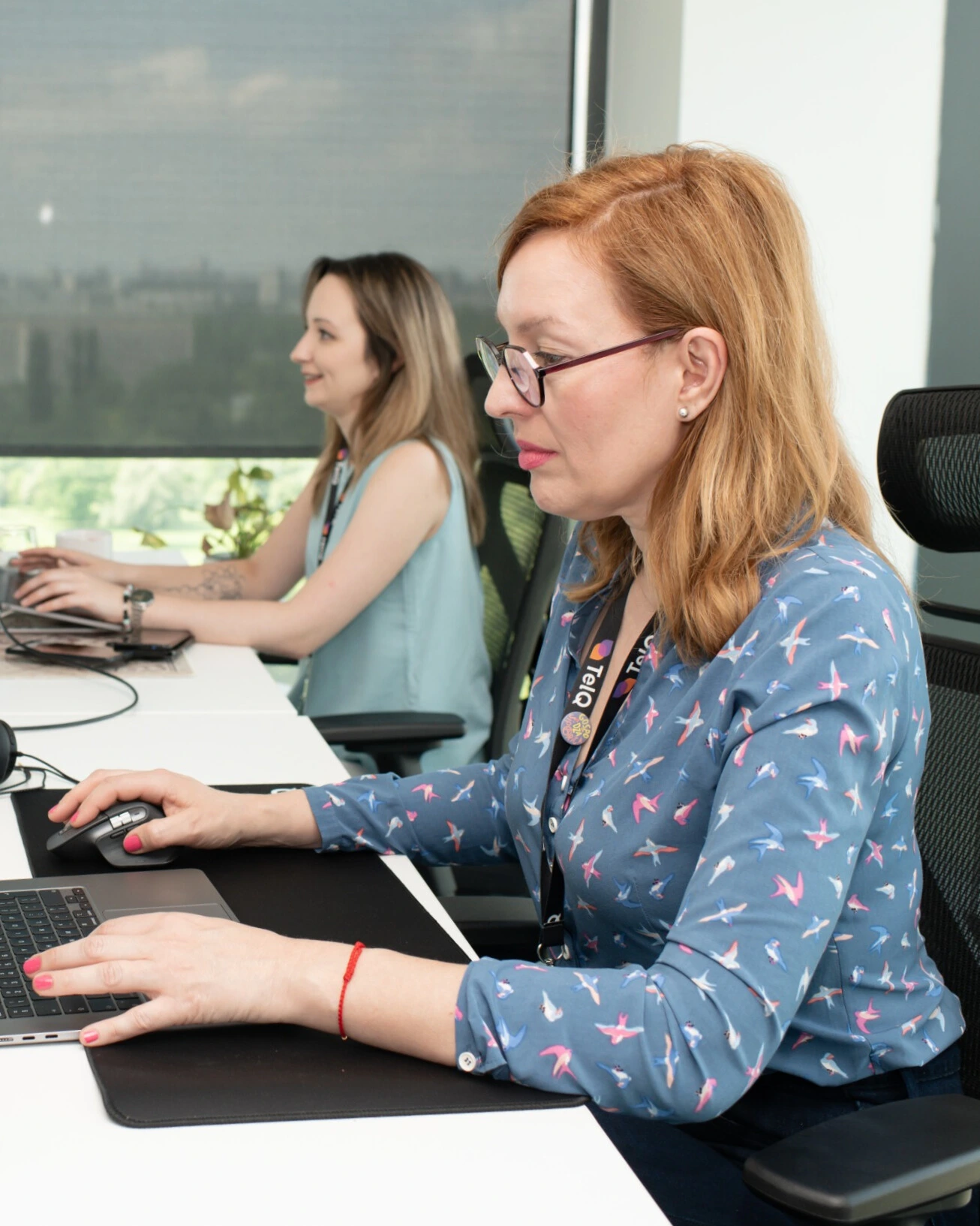 ClickTerm team members focused on their work at desks